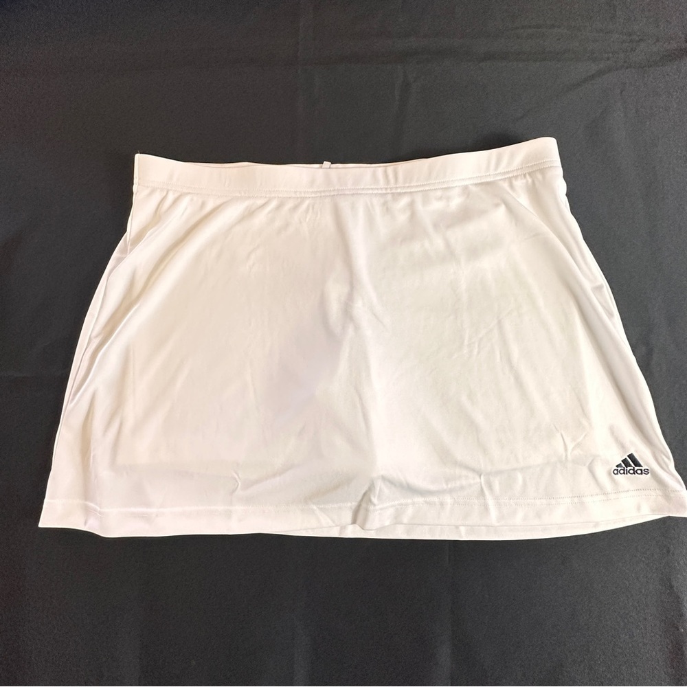 Adidas white tennis skirt with built in shorts. Size: XL